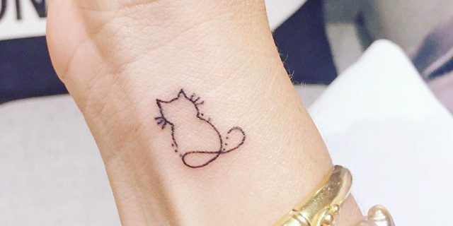 Кошка. Татуировки девушек на видных местах для знакомства и отношений